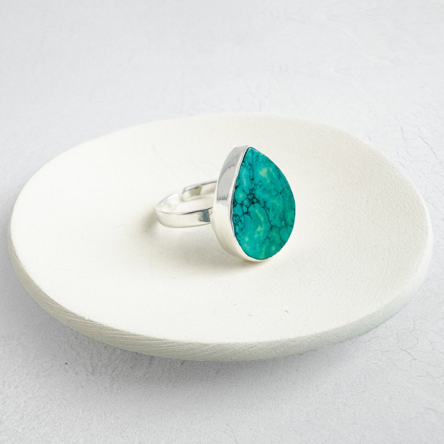 Natural Turquoise Teardrop Ring in Gold and Silver