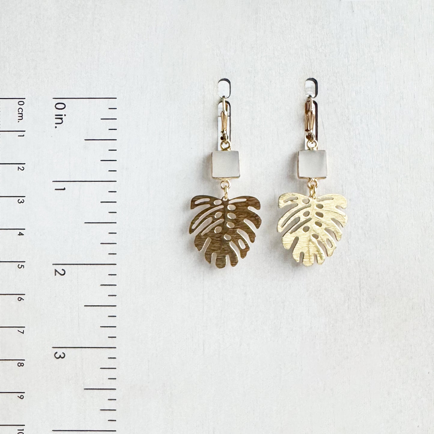 Raw Brass Monstera Leaf and White Onyx Earrings
