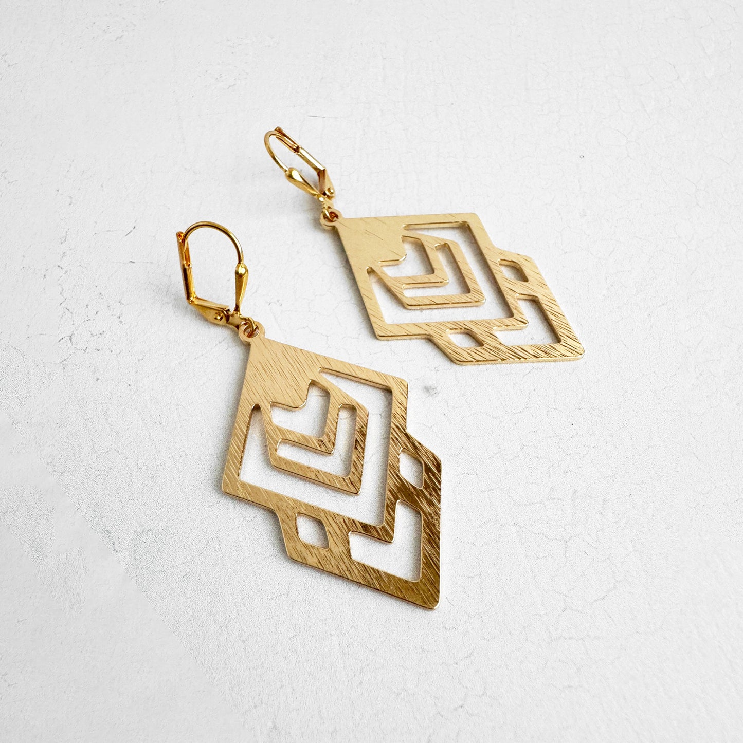 Abstract Geometric Dangle Earrings in Brushed Gold