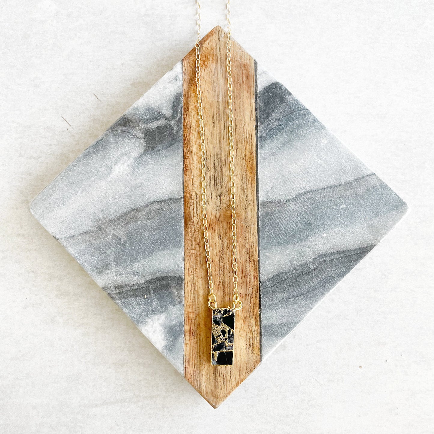Black Mojave Vertical Bar Necklace in Gold
