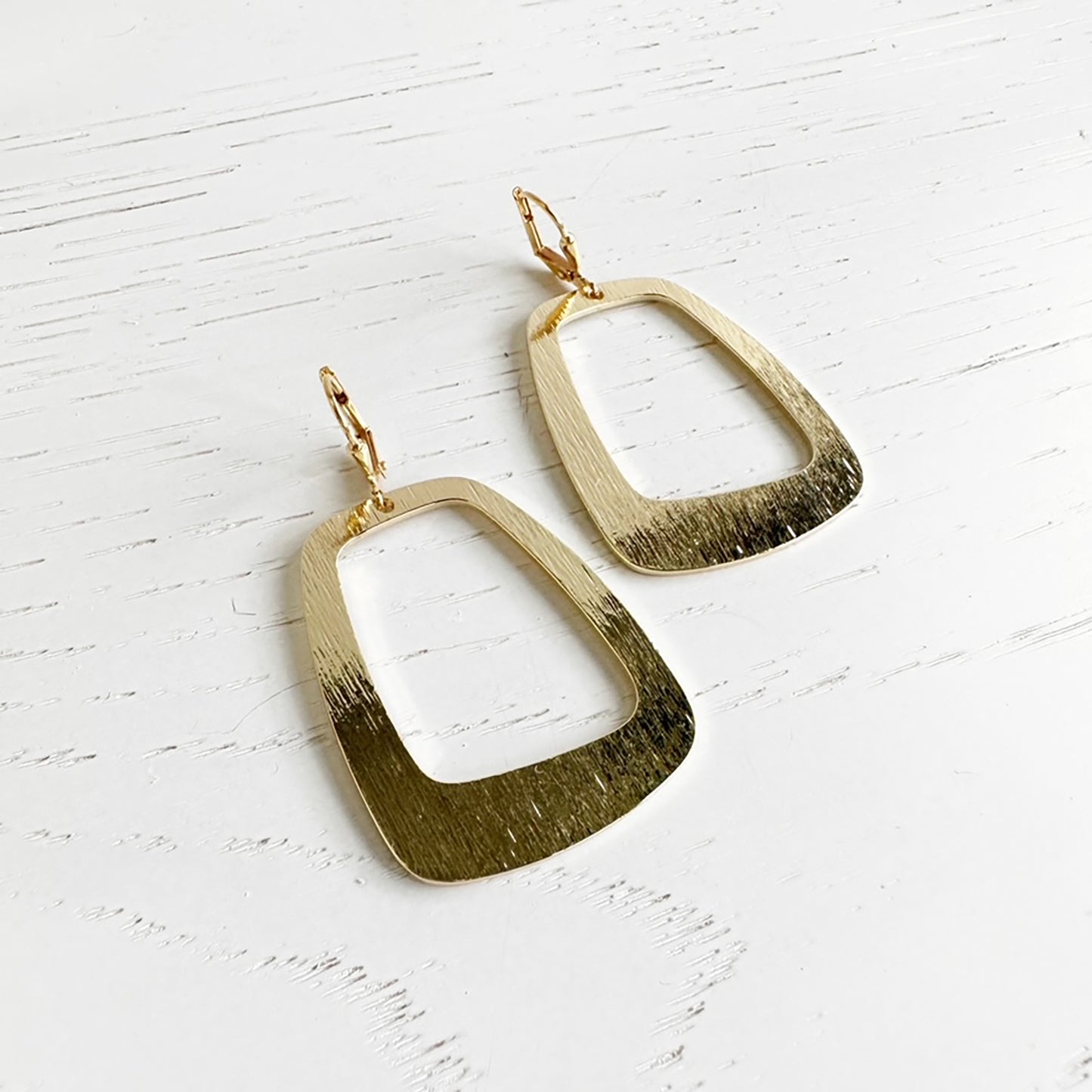 Asymmetrical Open Rectangle Earrings in Brushed Brass Gold