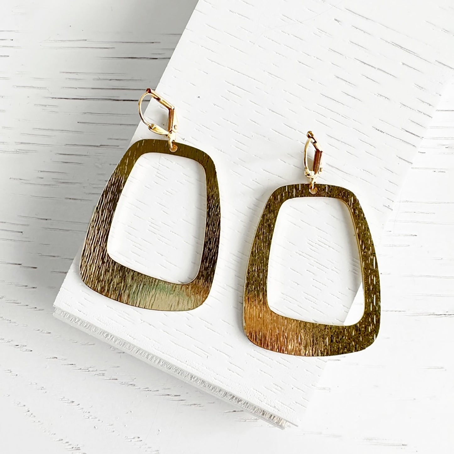Asymmetrical Open Rectangle Earrings in Brushed Brass Gold