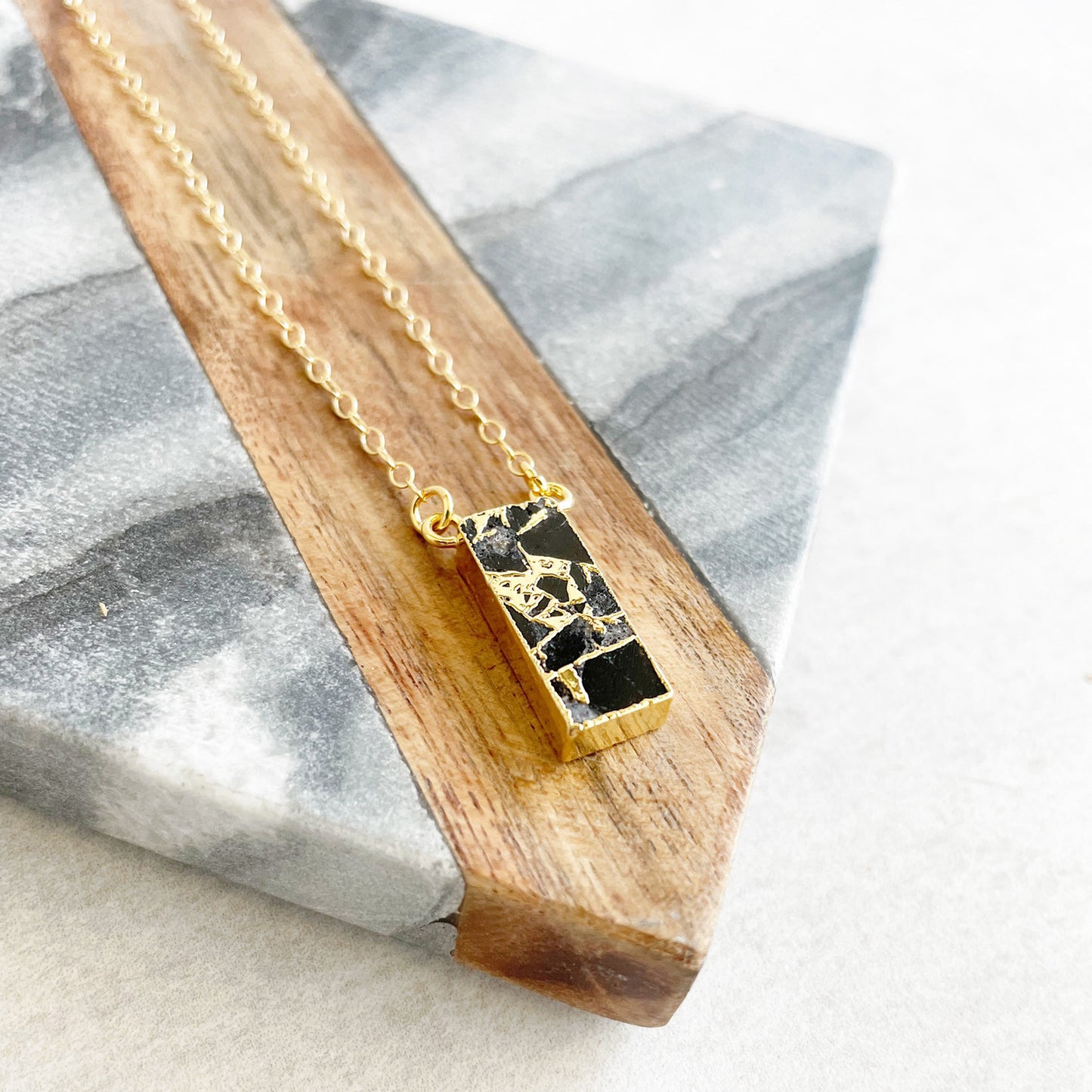 Black Mojave Vertical Bar Necklace in Gold