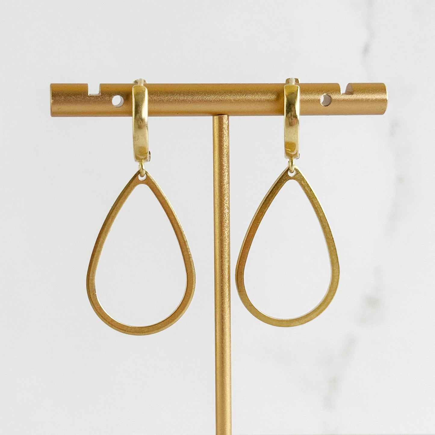 Open Teardrop Statement Huggie Earrings in Brass Gold