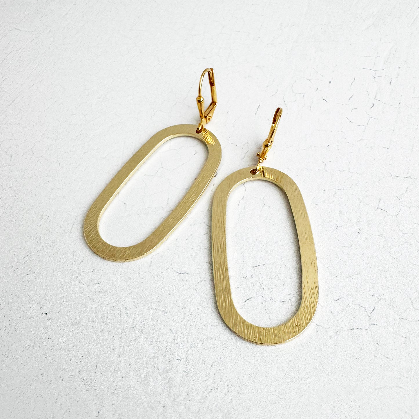 Oval Dangle Earrings in Brushed Gold