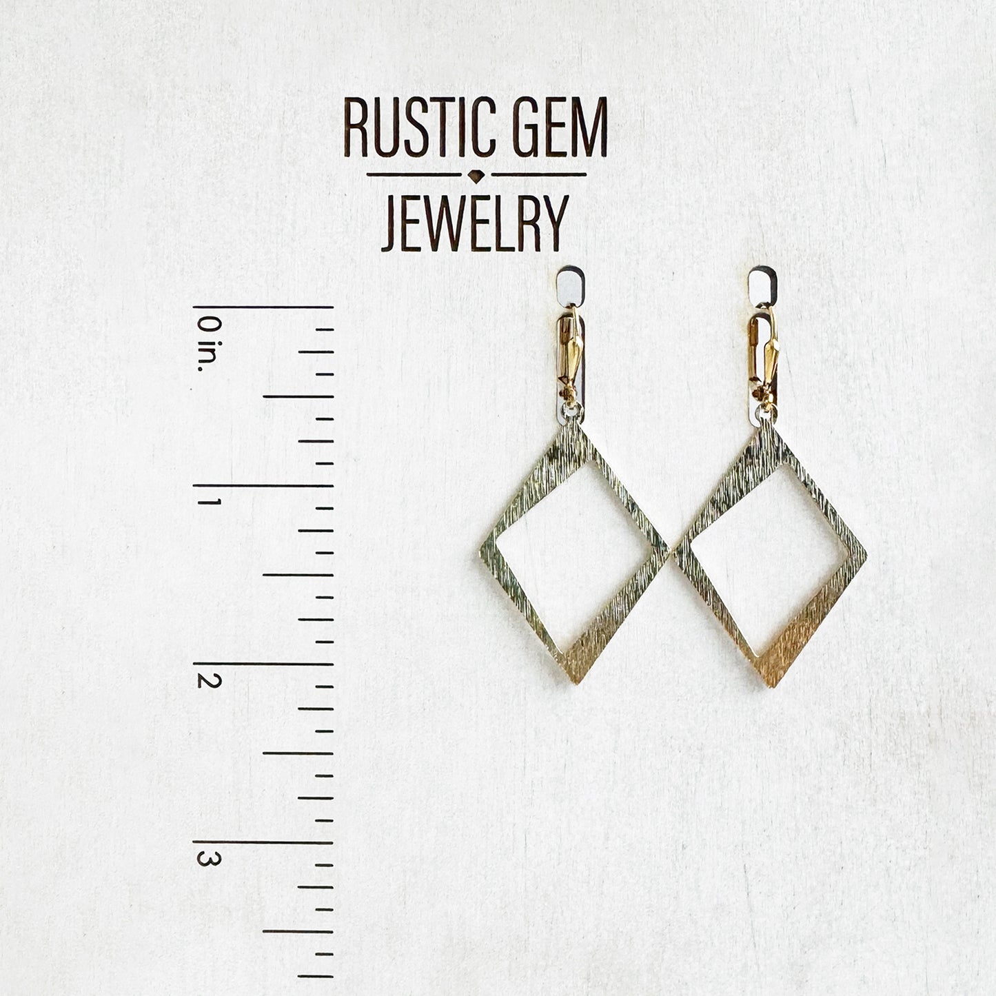 Asymmetrical Diamond Dangle Earrings in Brushed Gold