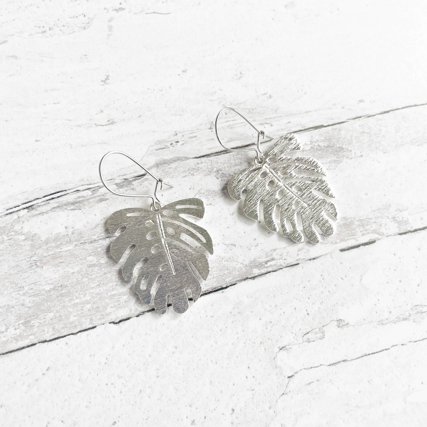 Monstera Leaf Dangle Earrings in Brushed Silver